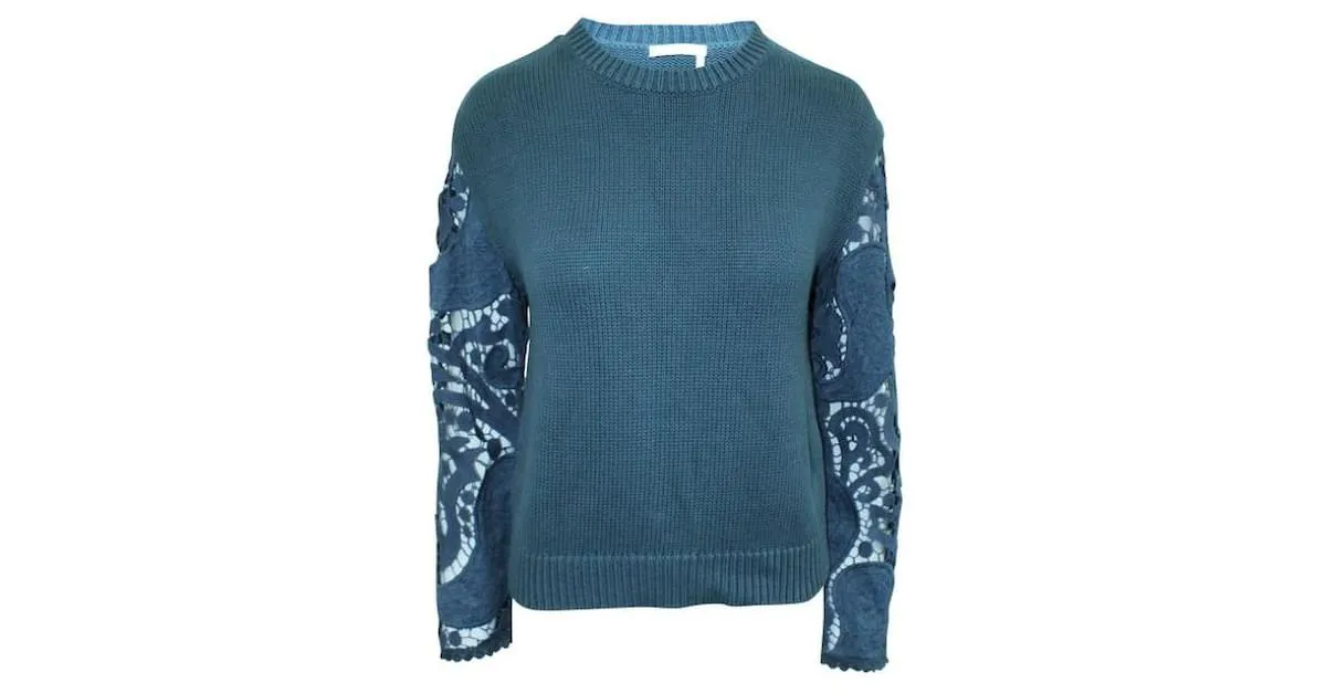 Autre Marque DISEÑADOR CONTEMPORÁNEO Suéter de punto azul marino con mangas bordadas 