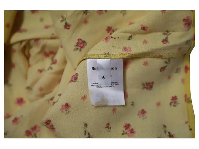 Falda midi fluida floral de Reformation en viscosa amarilla Amarillo 