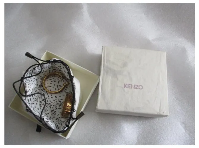 Kenzo Aros barrocos. Dorado 