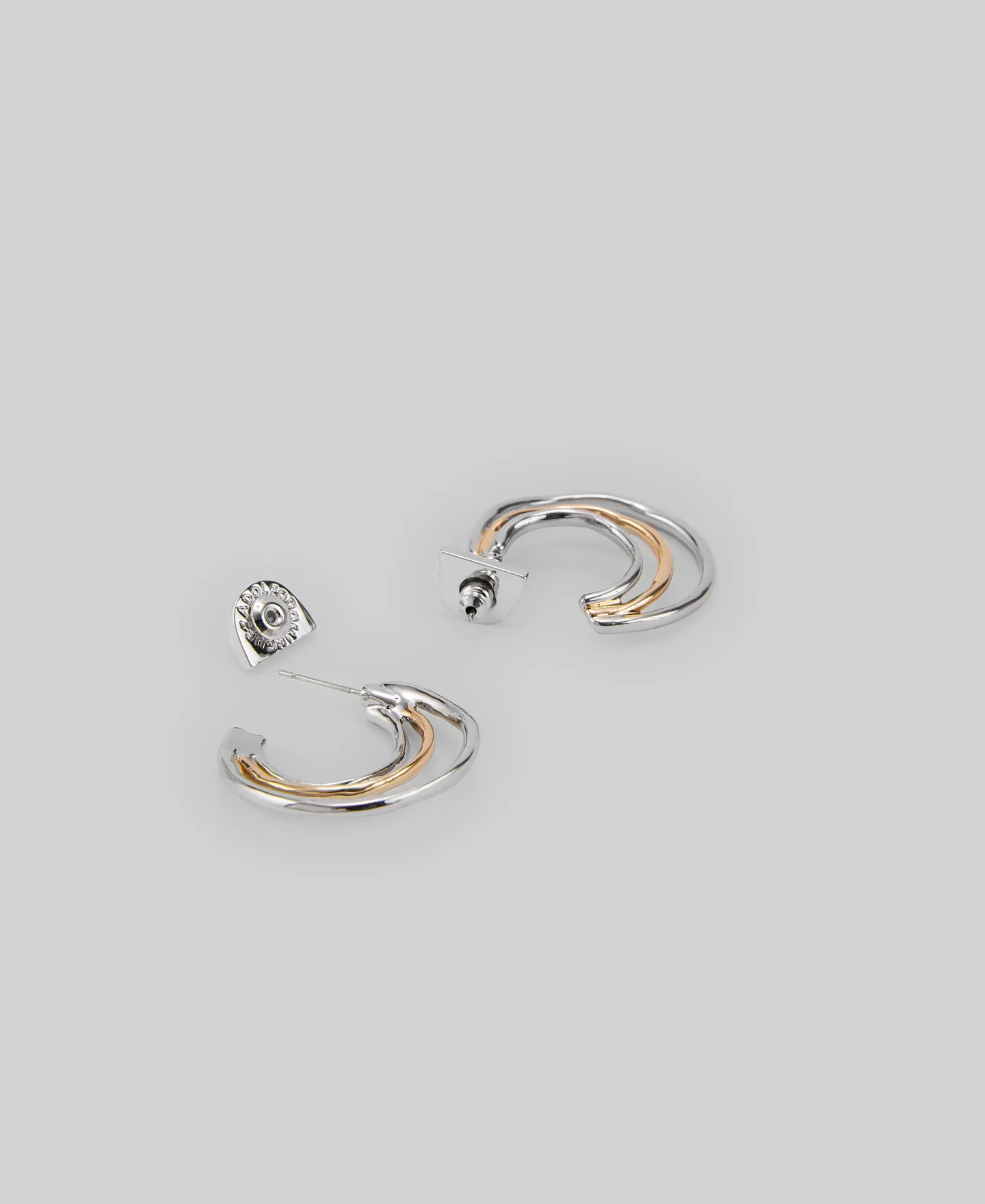 Metal earrings with tree hoops woman