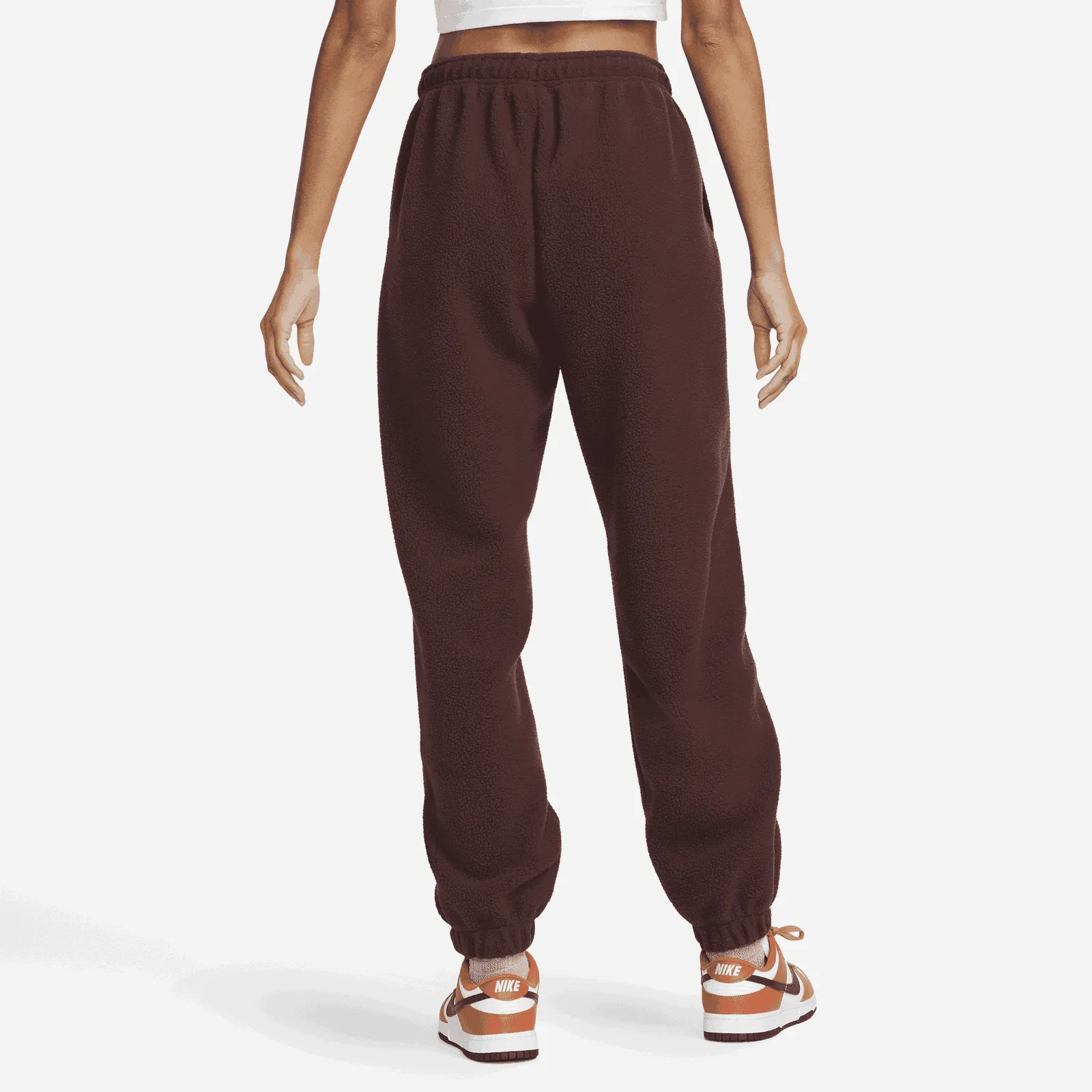 NIKE DáMSKé BěžECKé KALHOTY SPORTSWEAR PLUSH  ČERVENá