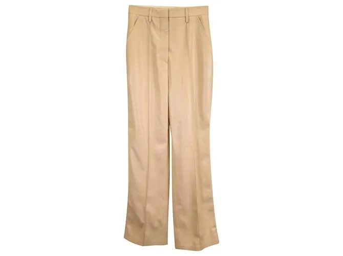 Pantalones Leena de Nanushka en poliuretano beige 