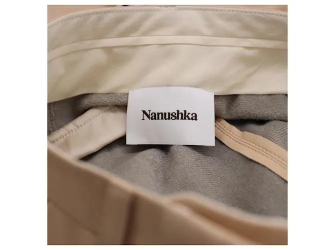 Pantalones Leena de Nanushka en poliuretano beige 