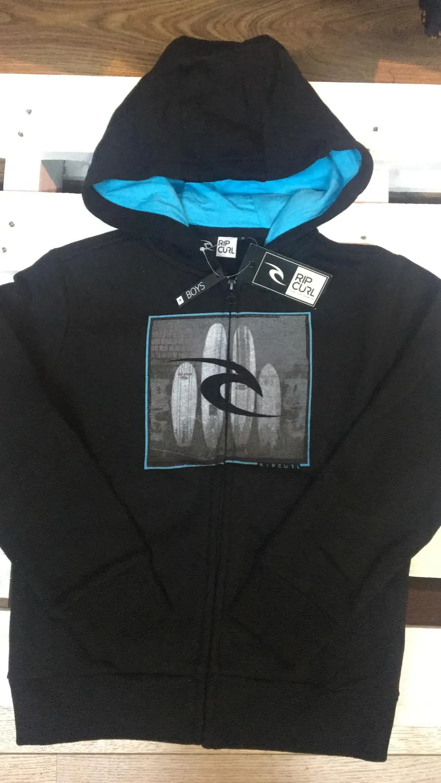 Sudadera niño Rip Curl con capucha para Chicos Ref. KFEAV4 BOARD PHOTO HZ FLEECE negra logo turquesa