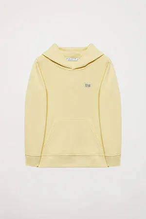Sudadera orgánica de capucha y bolsillos amarilla Neutrals kids con logo